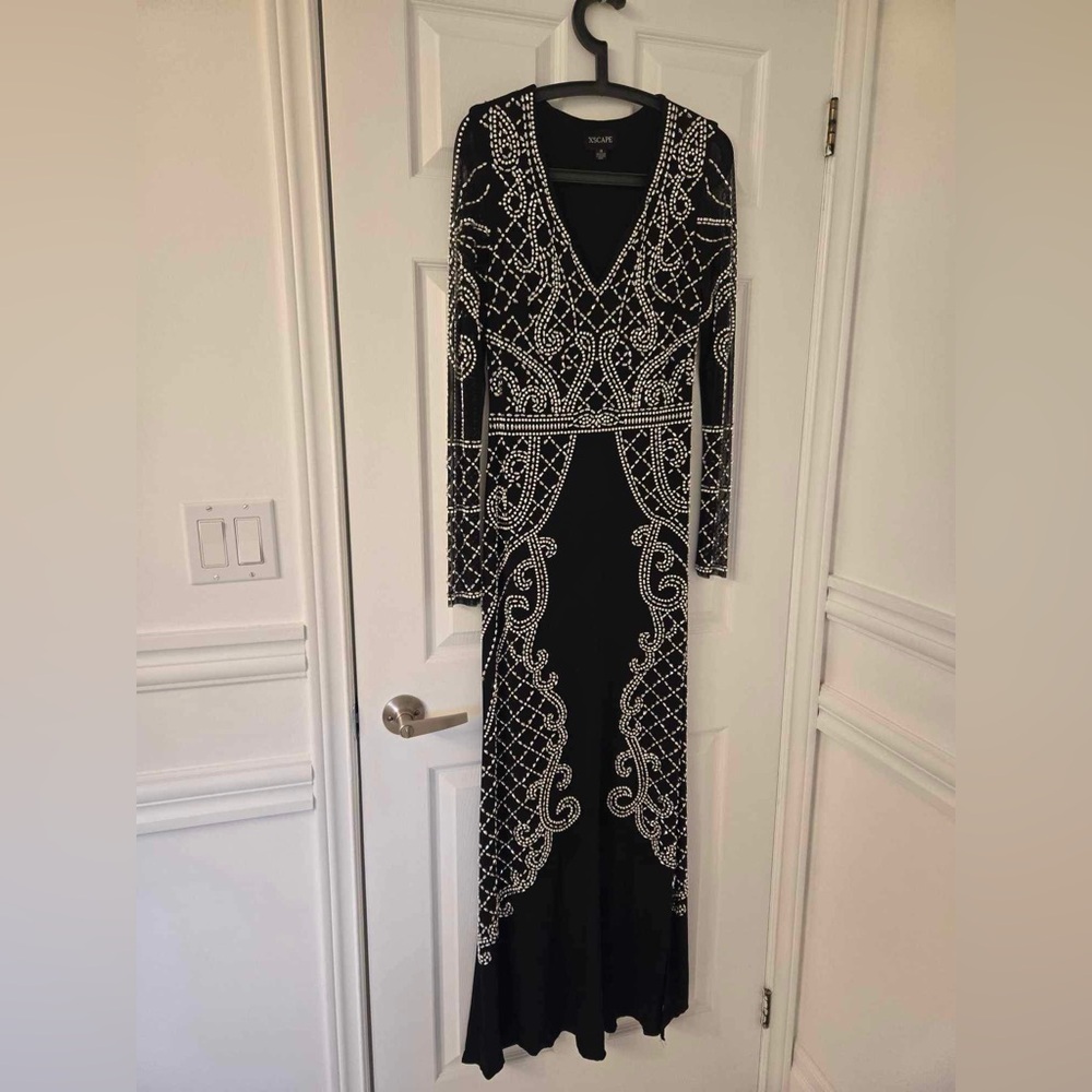 Xscape [ size 8] Sequin Long Sleeve Column Gown in Black and Silver